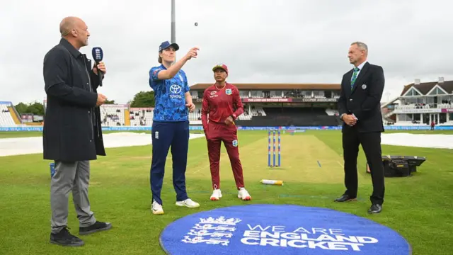 England captain Nat Sciver-Brunt tosses the coin watched by Mark Butcher, West Indies captain Shemaine Campbelle and match referee Dean Cosker