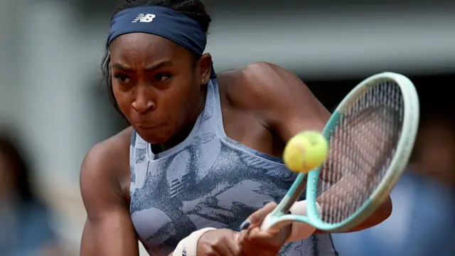 Coco Gauff plays a backhand return