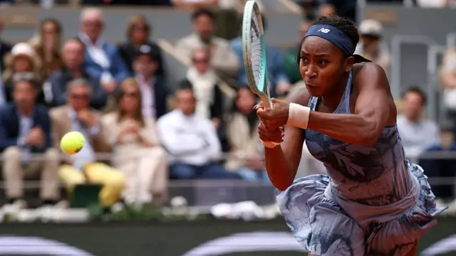 Coco Gauff plays a backhand return