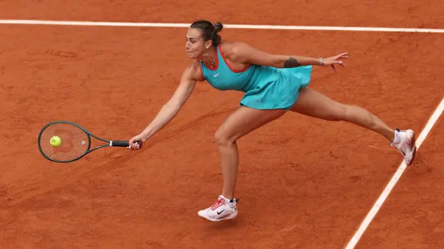 Aryna Sabalenka plays a forehand
