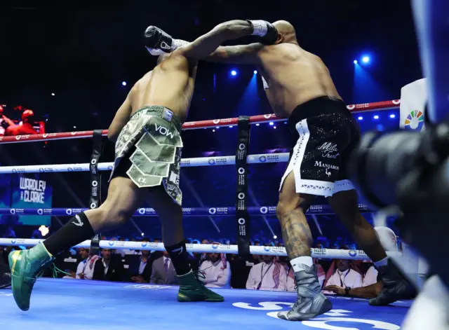 Fabio Wardley landing an overhand right on Frazer Clarke