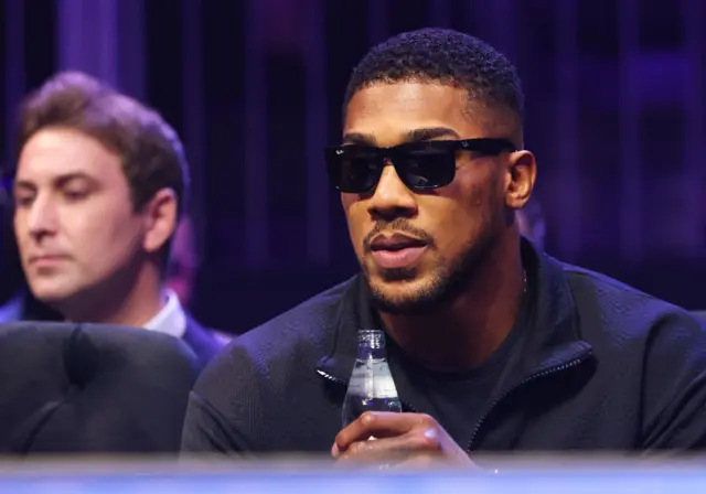 Anthony Joshua with sun glasses on