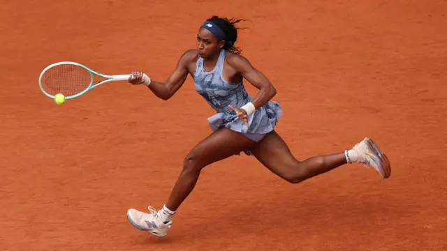 Coco Gauff plays a forehand