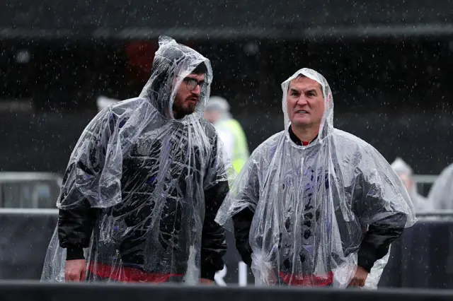 Two men in rain jackets
