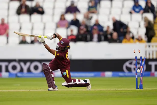 West Indies' Zaida James is bowled out by England's Em Arlott (not pictured) during the third Women's One Day International match at The Cooper Associates County Ground, Taunton
