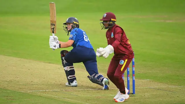 England batter Alice Capsey hits out watched by West Indies wicketkeeper Shemaine Campbelle