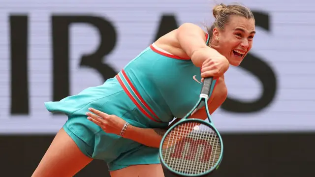 Aryna Sabalenka serves
