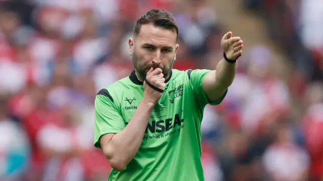 Referee Liam Moore