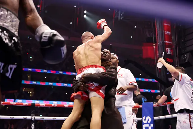 Chris Eubank Sr listing Chris Eubank Jr in celebration