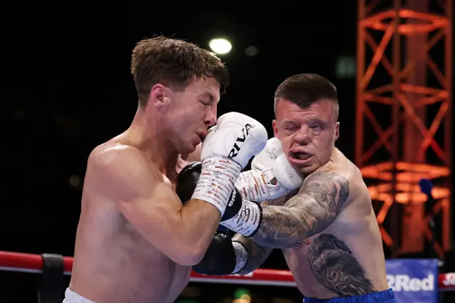 Pierce O'Leary and Liam Dillon both land punches on each other