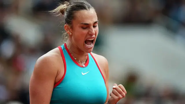 Aryna Sabalenka reacts to a point