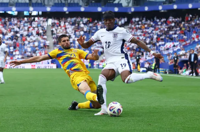 Andorra's Biel Borra in action with England's Noni Madueke