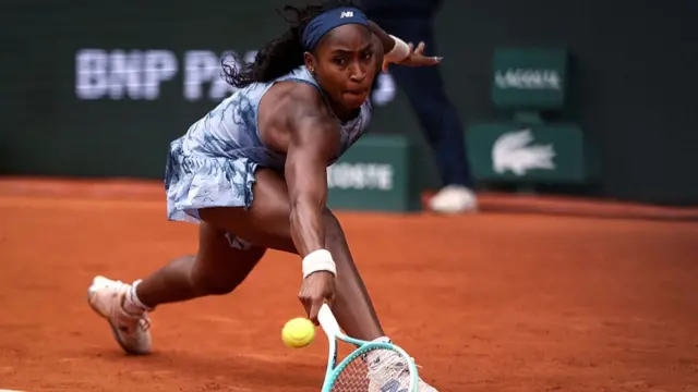 Coco Gauff reaches for a backhand return