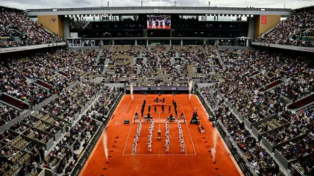 Artists perform during the ceremony prior to the women's singles final