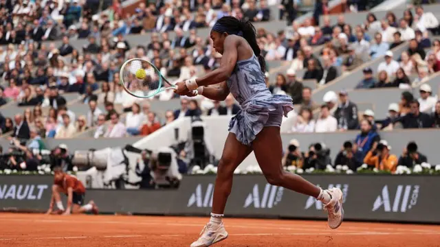 Coco Gauff plays a backhand return