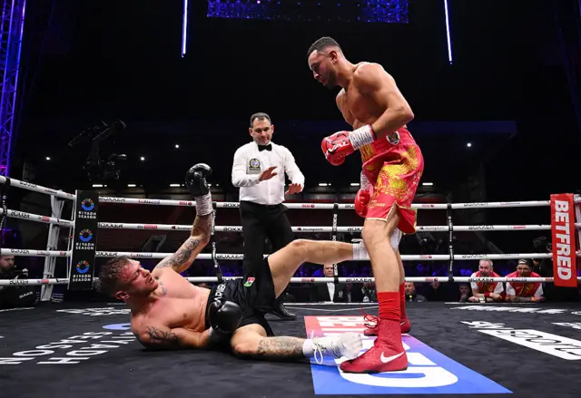 Callum Simpson stands over Ivan Zucco