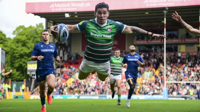 Try celebrations for Izaia Perese of Leicester Tigers as he goes over for a try