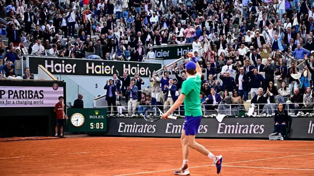 Spectators applaud as Italy's Jannik Sinner
