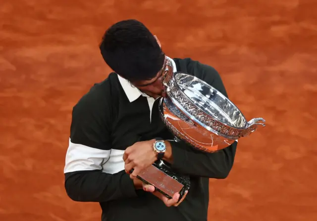 Carlos Alcaraz with the trophy