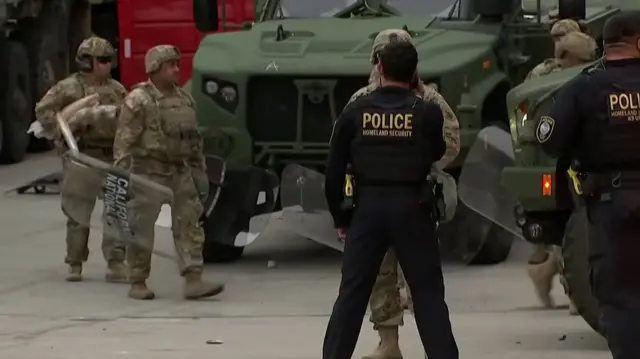 National Guard officials with police