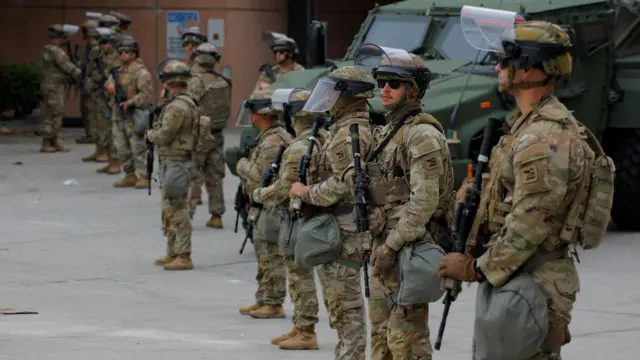 National Guard troops stand in a line