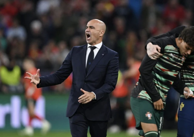 Nuno Mendes of Portugal celebrates after scoring