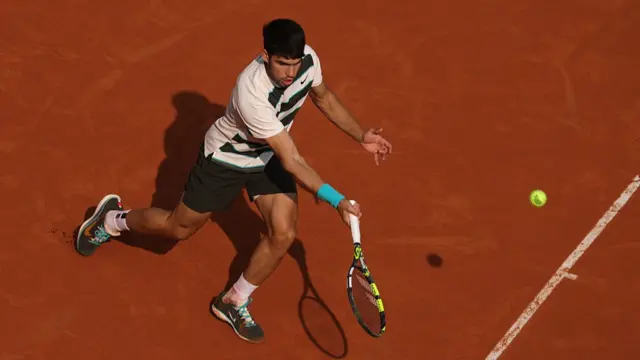 Carlos Alcaraz plays a forehand