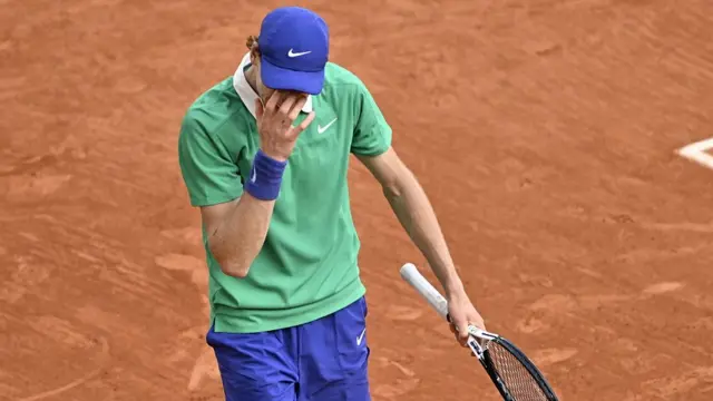 Jannik Sinner of Italy reacts