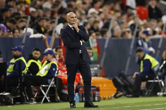 Portugal coach Roberto Martinez looks on