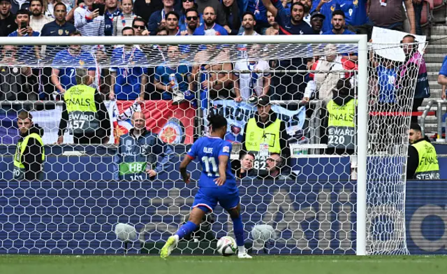Michael Olise scores