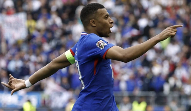 France's Kylian Mbappe celebrates scoring their first goal