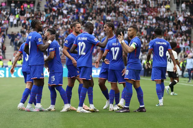 Kylian Mbappe of France celebrates with teammates