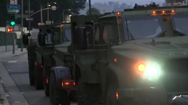 National Guard trucks line up