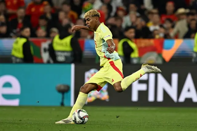 Lamine Yamal of Spain competes