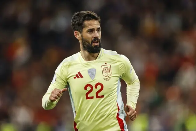 Isco of Spain looks on