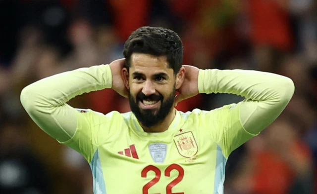 Spain's Isco reacts