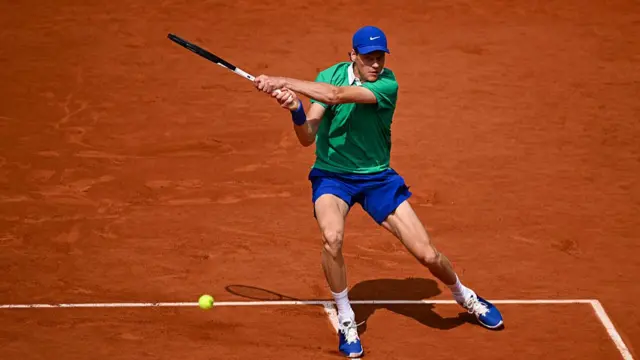 Jannik Sinner in action