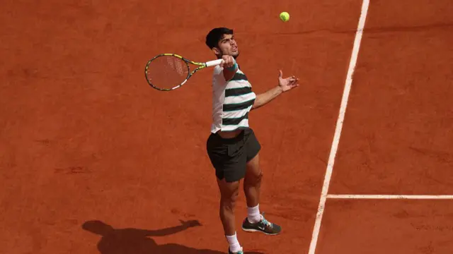 Carlos Alcaraz plays a forehand
