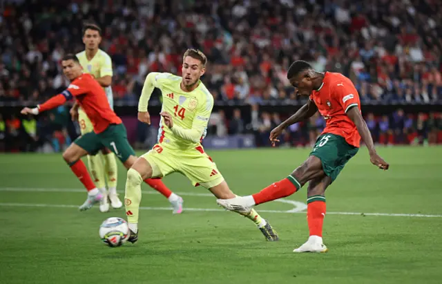 Nuno Mendes of Portugal scores