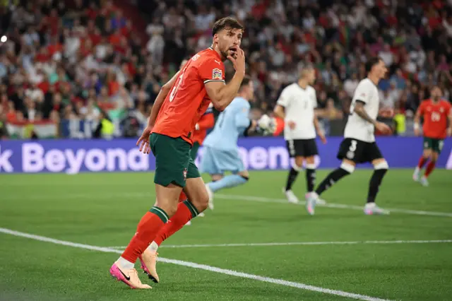 Ruben Dias of Portugal reacts