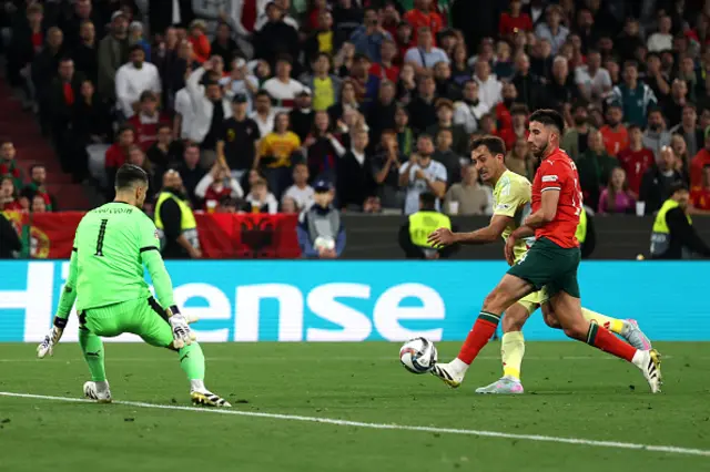 Mikel Oyarzabal of Spain scores