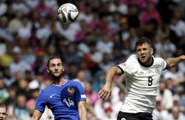 France's Adrien Rabiot in action with Germany's Niclas Fullkrug