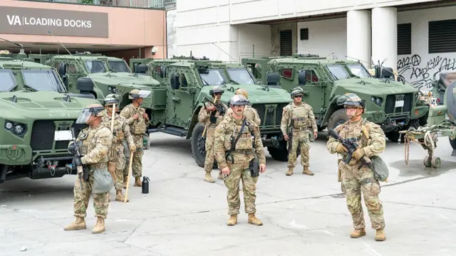 National Guard soldiers outside the Edward R. Roybal Federal Building during a demonstration in Los Angeles, California, US, on Sunday, June 8, 2025