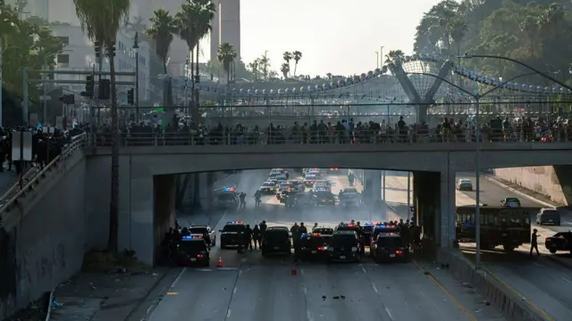 Protesters gather along highway 101 during a demonstration in Los Angeles, California, US,