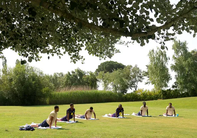 England taking part in yoga