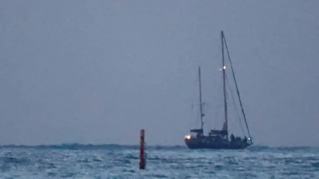 An image taken of the boat in low light from a distance