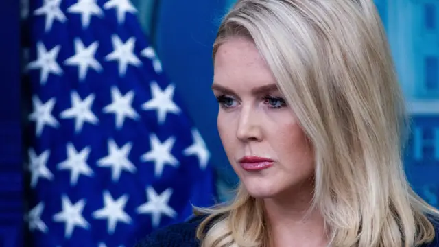Karoline Leavitt stands in a press briefing.