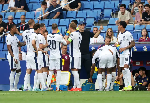 Tuchel speaking to England team pitchside