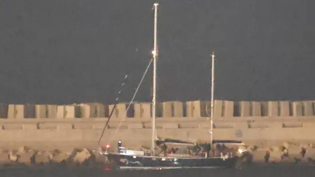 Dark image with boat docked