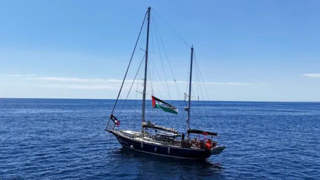 A drone view shows the Gaza-bound aid ship Madleen, organized by the international NGO Freedom Flotilla Coalition, anchored off the coast of Catania, Italy